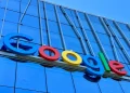 the google logo is displayed on the side of a building